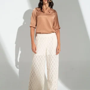 Blusa manga 3/4 elástico en puños.